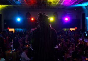 Back Stage photo of emcee Nicole Banister